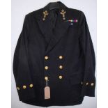 British Navy dress uniform jacket having brass naval buttons by Manclark and Son of London,