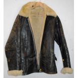 Old flying jacket, with some disrepair.