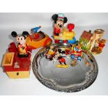 Small collection of Mickey Mouse and other figures, some wheeled. Also Mickey Mouse birthday tray.