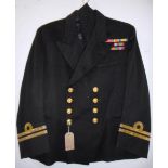 British Navy dress uniform black jacket with Baker and Co of Portsmouth interior pocket label "W L