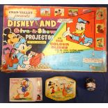 Mickey mouse projector in box, tin, bicycle bell and birthday card.