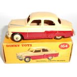 Dinky. 164 Vauxhall Cresta Saloon. 1957-60. Maroon/cream. Average condition. Boxed.