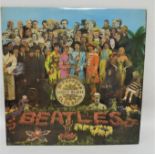 The Beatles, Sgt Pepper 1st UK stereo pressing with cut outs. Matrix: Side 1 YEX 637-1, Side 2 YEX