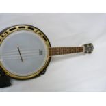 Countryman Pro Banjolele with resonator back, in fitted hard case.