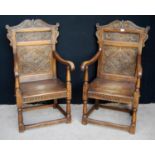 Pair of 19th century carved oak armchairs, each with acanthus serpentine pediment over panelled
