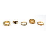 Two gold openwork rings and three others, all 9ct, 14g.