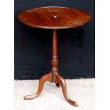 Georgian pedestal table, the circular top raised on baluster turned column, tripod cabriole legs