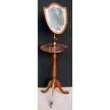 Edwardian mahogany shaving mirror and stand with shield-shaped mirror, circular top, baluster column