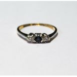Diamond and sapphire three-stone ring '18ct Plat', size M½, 2g.