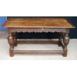Late 17th or early 18th century oak refectory table, the rectangular top over shaped apron, raised