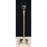 Brass Corinthian column standard lamp with reeded column, square plinth base and claw and ball feet,