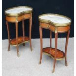 Pair of king wood kidney-shaped side tables, each with brass gallery, marble top, frieze drawer,