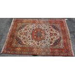 Persian rug with central medallion, all over floral design, cream ground, spandrels and triple