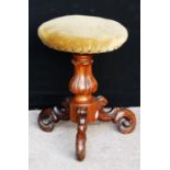 Victorian rosewood adjustable piano stool, the circular cushioned seat raised on baluster column and