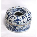 19th century blue and white circular bowl decorated with vases, scrolls and foliage, 26cm diameter