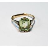 Ring with pale green spinel in 9ct gold, size V.