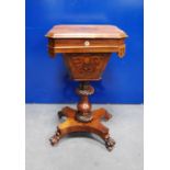 Victorian rosewood work table, the moulded rectangular hinged top with canted corners enclosing