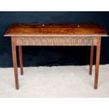 18th century side table, the moulded rectangular top over carved frieze and raised on square legs,