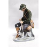 Royal Copenhagen figure of a gentleman with shotgun in hand, 21cm high.