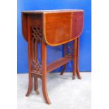 Edwardian mahogany Sutherland table, the crossbanded rounded rectangular top on square legs, splayed