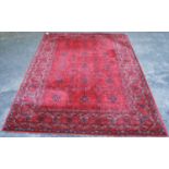 Royal Keshan carpet with floral design over red ground and border, 366cm x 274cm.