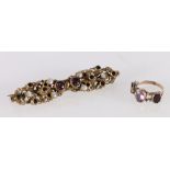 Victorian pinchbeck brooch set with amethyst and mother of pearl, 7.5cm long and a unhallmarked