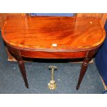 19th century mahogany and crossbanded demi lune turnover card table raised on turned supports, 89cm