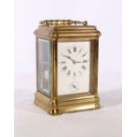 19th century repeater carriage clock in brass case, the enamel dial with Roman numerals and