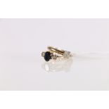 9ct gold diamond solitaire ring, the round diamond approximately 0.2ct, makers mark TAD, ring size