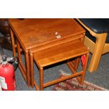 Mid 19th century nest of three teak tables, each with rectangular top, raised on simple legs