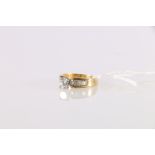 18ct gold diamond ring, the central round brilliant diamond approximately 0.9ct flanked by twelve