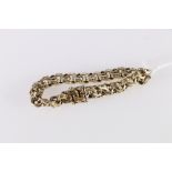 Gents 9ct gold fancy entwined curb link bracelet, stamped to closure 375, makers marks DJE, 41.4g