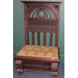 19th century carved oak hall chair with pierced octofoil back and finger carved panel, slip in seat,