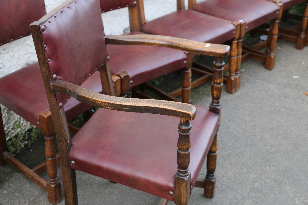 Set of eight oak panel back dining chairs including two carvers raised on turned supports - Image 2 of 3