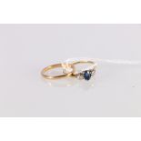18ct gold plain wedding band, ring size, 2.35g and an unhallmarked yellow metal sapphire and diamond