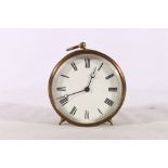 Brass bulk head clock with white enamelled dial having Roman numerals, 10cm diameter