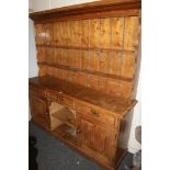 Antique pine Welsh dresser, the top with two plate rack shelves above three frieze drawers over