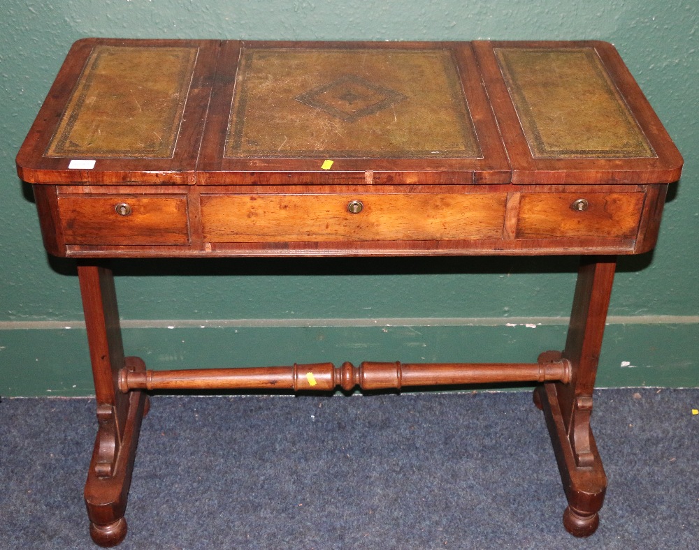 Victorian rosewood desk, the pop up top with inset leather skivers raised one trestle base united by - Image 2 of 3