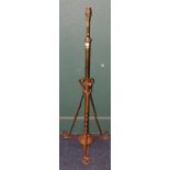 Brass and copper adjustable telescopic standard lamp, the base stamped FC