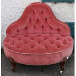 Victorian Ladies chair with bell shaped back upholstered in pink button back fabric raised on ornate