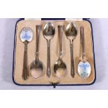 Set of six silver gilt and enamel coffee spoons by Turner & Simpson, Birmingham 1913/1938, in fitted