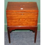 19th century mahogany and inlaid wine cooler raised on square tapering supports, 46cm long 27cm deep