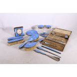Art Deco silver and guilloche enamel dressing table set comprising hand mirror, brushes, etui in