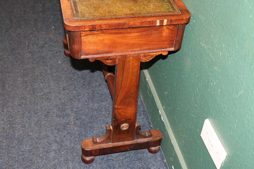 Victorian rosewood desk, the pop up top with inset leather skivers raised one trestle base united by - Image 3 of 3