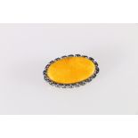 Russian 875 grade silver mounted brooch set with central flat polished amber style stone, the