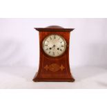 Art Nouveau mahogany and inlaid mantle clock with domed top, silvered guilloche style dial with