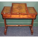 Victorian rosewood desk, the pop up top with inset leather skivers raised one trestle base united by