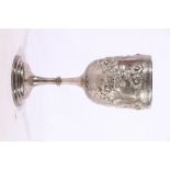 Victorian silver chalice or goblet with repousse flower decoration by George Unite & Sons,