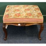 19th century mahogany stool upholstered in floral patterned tapestry raised on french cabriole