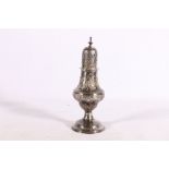 George III silver sugar caster of baluster form with floral chased engraving by Peter & William